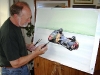 John at the drawing board, working on the Nick Crowe & Mark Cox fundraising painting.