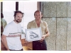 John presenting a set of four original drawings to Mike Hailwood at the 1978 TT races.