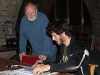 John with Guy Martin who both signed a limited edition of 50 prints, sales of which raised £1500 for the Manx Grand Prix Helicopter fund (TT 2011)