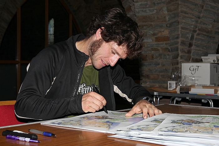 Guy Martin signs the limited edition prints